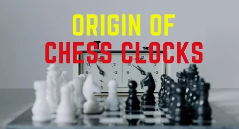 Chess clock behind chess set